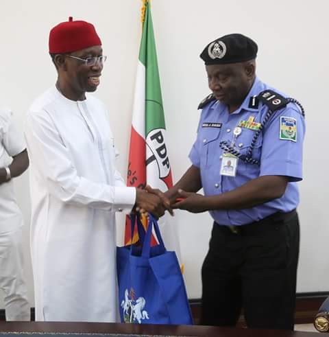 Delta State Governor, Senator Ifeanyi Okowa (left) in a warm handshake with, Musa Daura, AIG, Zone 5, during a courtesy call to the Governor by the AIG and his Team