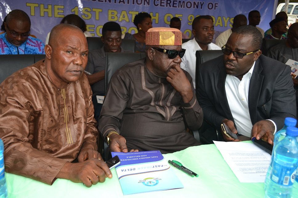 Obayomi Oladipo, Managing Director/Chief Executive Officer, FastTrack 90 (right) Chief Dan Okenyi, Commissioner for Lands and Survey (middle) and Surveyor, Okeoghene Osiawa, Surveyor General of Delta State during the presentation of Certificate of Occupancy (C of O) to the Beneficiaries in Asaba on Friday. PHOTO: GODDY UMUKORO